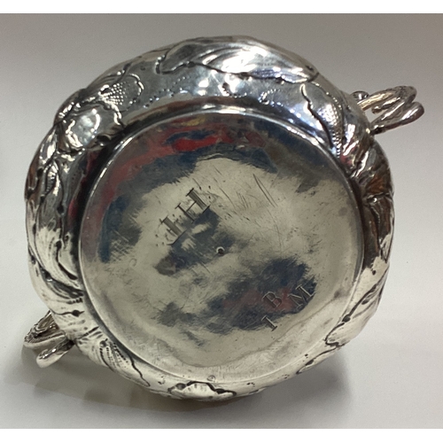 486 - A fine 17th Century silver porringer with crested decoration to body. Circa 1670. By Nathaniel Weekl... 