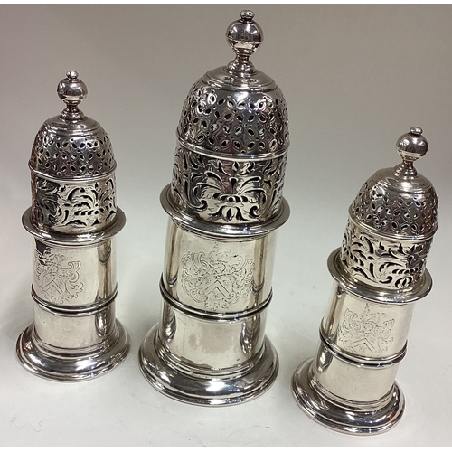 489 - A set of three large and fine 17th Century Queen Anne silver sugar casters. 1697. By Charles Adam. A... 