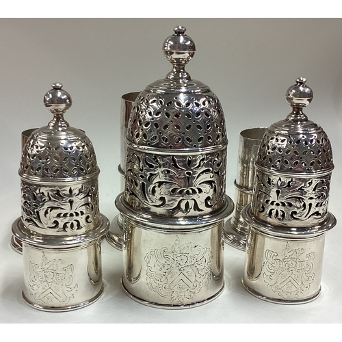 489 - A set of three large and fine 17th Century Queen Anne silver sugar casters. 1697. By Charles Adam. A... 