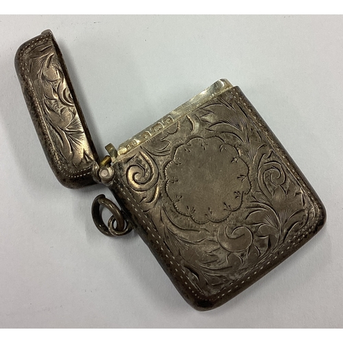 497 - A small engraved silver vesta case. Birmingham. Approx. 29 grams. Est. £20 - £30.