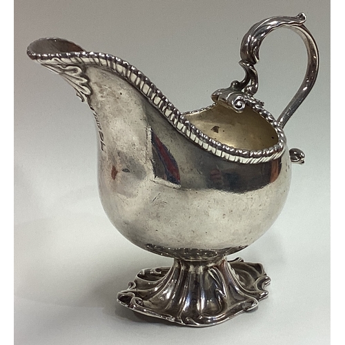 505 - An 18th Century George III silver sauce boat. London 1766. By Fuller White. Approx. 193 grams. Est. ... 