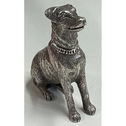 508 - A rare Victorian silver pepper in the form of a dog. Marked to base. London 1890. By CSFS. Approx. 5... 