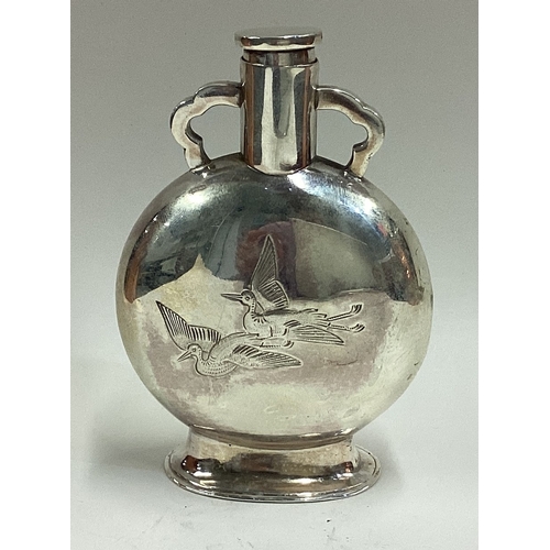 522 - A rare Aesthetic Movement Victorian silver scent flask chased with birds. Fully marked to body and c... 