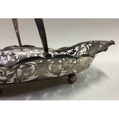 532 - A pierced Edwardian silver basket with scroll decoration. Birmingham. Approx. 415 grams. Est. £150 -... 