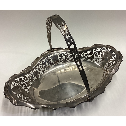 532 - A pierced Edwardian silver basket with scroll decoration. Birmingham. Approx. 415 grams. Est. £150 -... 