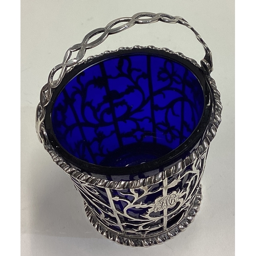 555 - A small 18th Century silver and glass basket. Maker and lion mark only. Circa 1770. Approx. 73 grams... 