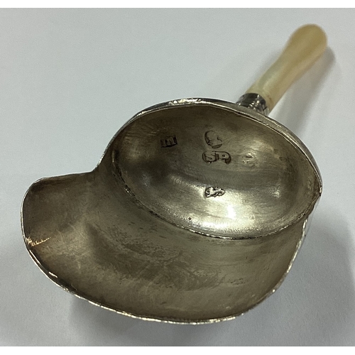 561 - A Georgian silver caddy scoop with tapering handle. Birmingham. By Samuel Pemberton. Approx. 7 grams... 