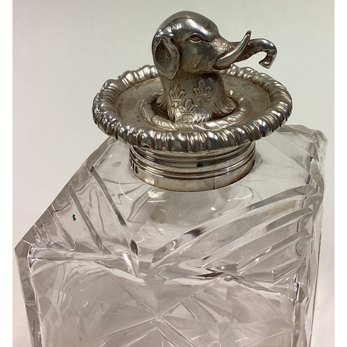 606 - A rare Victorian silver and glass inkwell cast with elephant finial. London 1872. By George Fox. Est... 