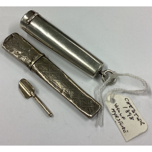 618 - A small silver cigarette holder together with a needle case. Approx. 24 grams. Est. £20 - £30.