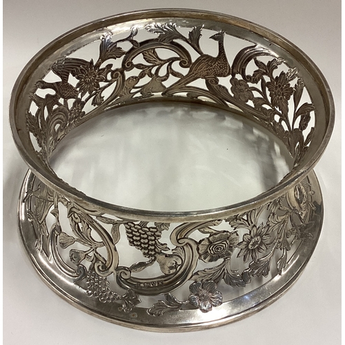 636 - CHESTER: A fine pierced silver ring dish decorated with birds in the Chinoiserie style. 1910. By Geo... 