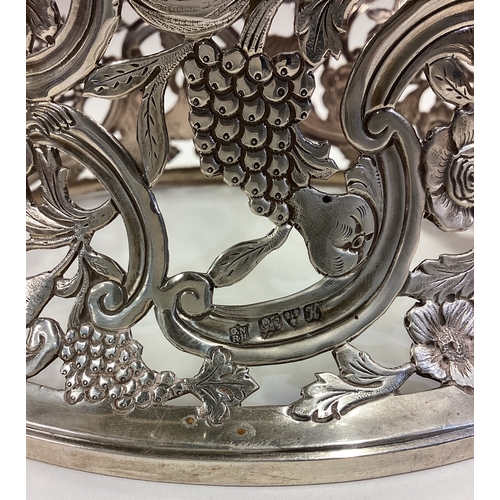 636 - CHESTER: A fine pierced silver ring dish decorated with birds in the Chinoiserie style. 1910. By Geo... 