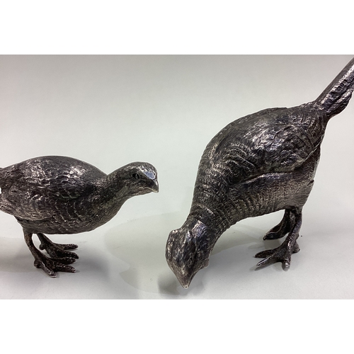 671 - A pair of cast silver figures of pheasants. London 1975. By SMD Castings. Approx. 380 grams. Est. £4... 