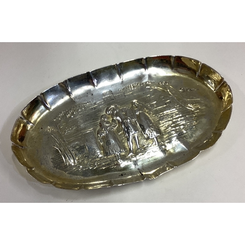 675 - A chased Victorian silver gilt charger embossed with scenes. London 1881. By William Comyns. Approx.... 