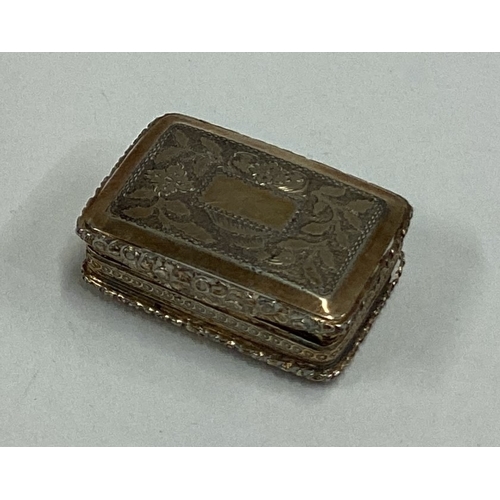 676 - A 19th Century silver gilt vinaigrette. Birmingham. By Taylor & Perry. Approx. 18 grams. Est. £150 -... 