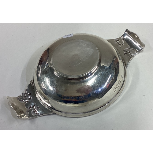 681 - A silver quaich. London 1904. By WG Connell. Approx. 70 grams. Est. £80 - £120.