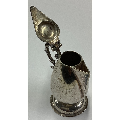 703 - An 18th Century Dutch silver toy flagon. Marked to base. Approx. 33 grams. Est. £400 - £600.