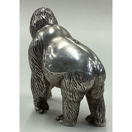 711 - PATRICK MAVROS: A silver figure of a gorilla. Approx. 331 grams. Est. £1000 - £1500.