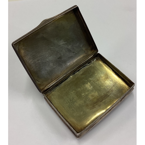 712 - A 19th Century Continental silver snuff box with stone inset to centre engraved with scenes. Approx.... 