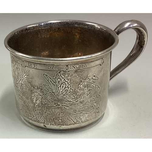 715 - An American silver christening mug. Engraved with month, year and birth record. Approx. 44 grams. Es... 