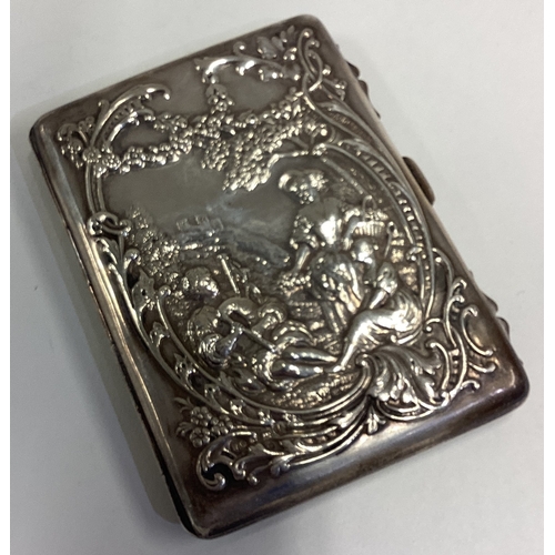 716 - An early 20th Century chased silver card holder embossed to both sides with scenes of villagers and ... 