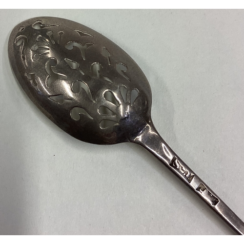 725 - An 18th Century silver mote spoon. Maker and lion mark only. Circa 1780. By Thomas Shepherd. Approx.... 