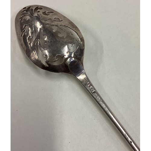 726 - A large silver mote spoon. Maker's mark only. By EH. Possibly Provincial? Approx. 7 grams. Est. £120... 