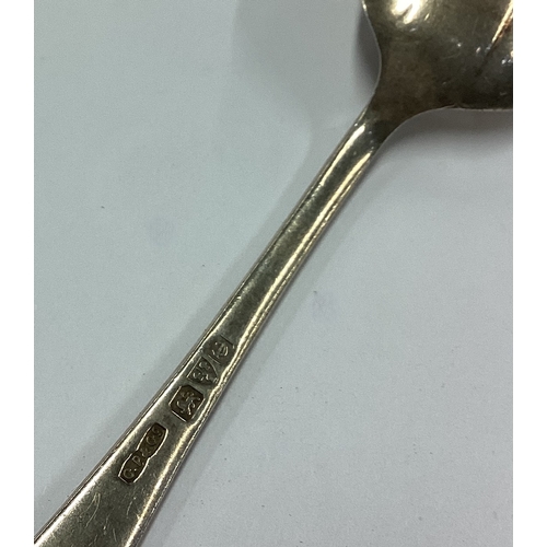 84 - CHESTER: A silver spoon engraved with a figure bowling. Approx. 17 grams. Est. £20 - £30.