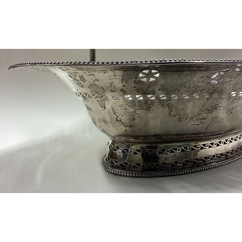 93 - An 18th Century George III silver basket with pierced and bright-cut decoration. London 1782. By Cha... 