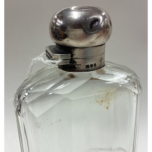 94 - A silver and glass flask. London 1915. Est. £50 - £80.