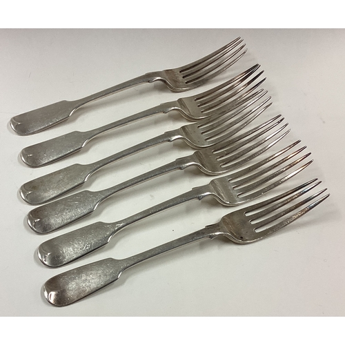 736 - A matched set of six silver fiddle pattern dessert forks. London. Various dates and makers. Approx. ... 