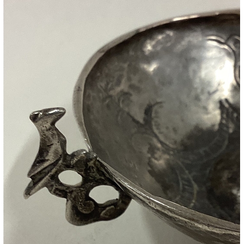 741 - A good Continental silver pin dish decorated with birds. Approx. 56 grams. Est. £25 - £30.