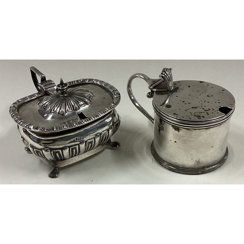 743 - Two silver mustard pots. Various dates and makers. Approx. 61 grams. Est. £20 - £30.