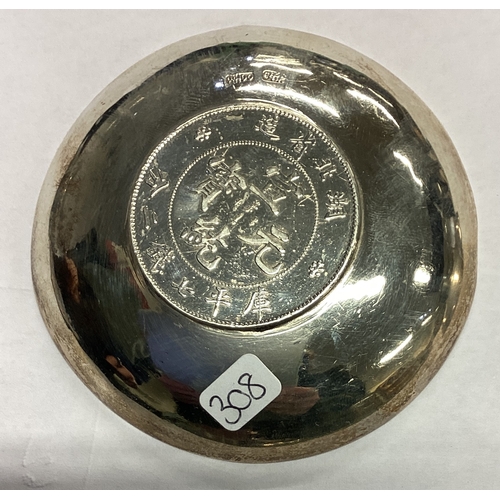 308 - WANG HING: A Chinese export silver coin dish. Marked to base. Approx. 62 grams. Est. £60 - £80.