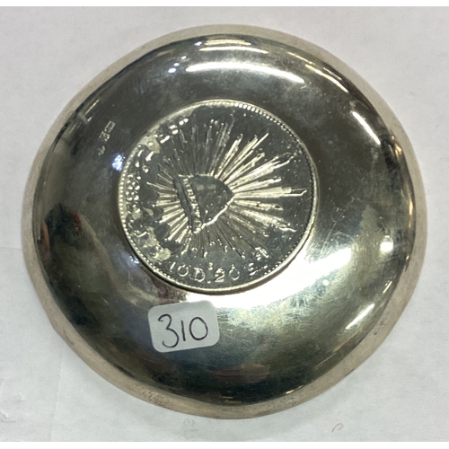 310 - WANG HING: A Chinese export silver coin dish. Marked to base. Approx. 63 grams. Est. £60 - £80.