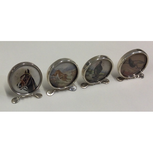 210 - CHESTER: A set of four silver menu holders depicting a horse, rabbit, bird or pheasant. Circa 1900. ... 