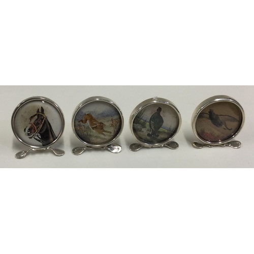 210 - CHESTER: A set of four silver menu holders depicting a horse, rabbit, bird or pheasant. Circa 1900. ... 