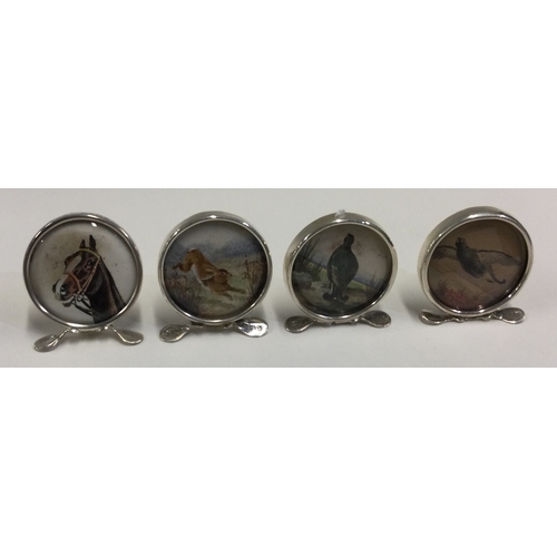 210 - CHESTER: A set of four silver menu holders depicting a horse, rabbit, bird or pheasant. Circa 1900. ... 