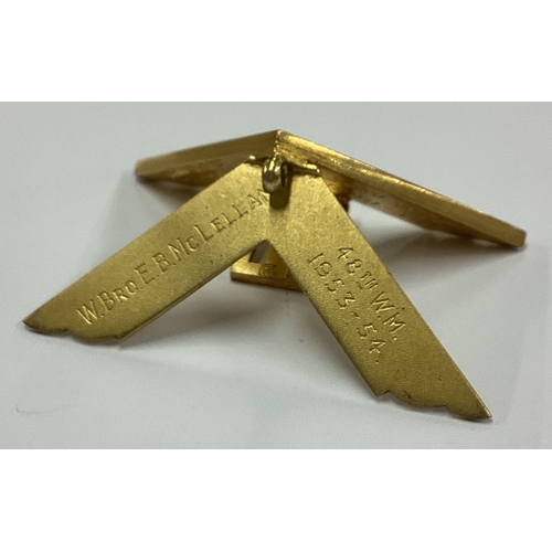 102 - A good quality silver gilt Masonic toy square with chased decoration. London. Approx. 11 grams. Est.... 