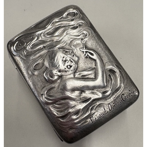 11 - An impressive Art Nouveau French silver snuff box with chased decoration depicting a woman smoking. ... 