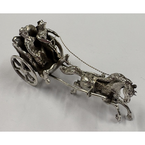 113 - An Antique silver table toy of a horse and carriage. Approx. 24 grams. Est. £30 - £40.