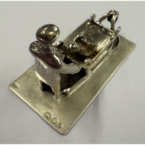 115 - An Antique Dutch silver table toy. Approx. 17 grams. Est. £30 - £40.