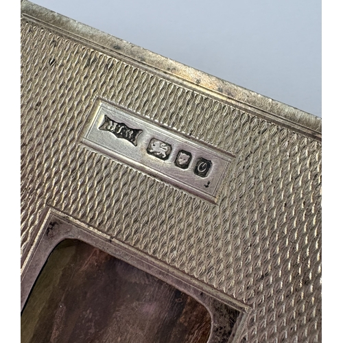 120 - An engine turned silver card holder. London 1988. By SJ Rose & Son. Approx. 64 grams. Est. £60 - £80... 