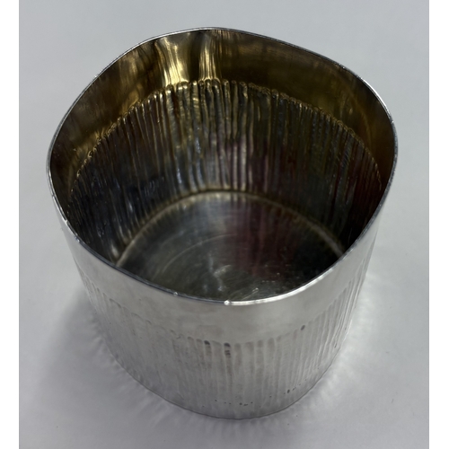 121 - A Continental Sterling silver beaker with bark finish. Marked to base. Approx. 116 grams. Est. £100 ... 