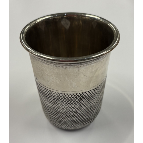 134 - An unusual German Sterling silver 'thimbleful' cup. Marked 925. Approx. 40 grams. Est. £80 - £120.