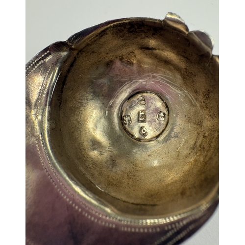 140 - A silver caddy spoon in the form of a jockey cap. Birmingham 1814. By John Taylor. Approx. 4 grams. ... 