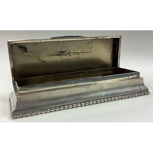 145 - A large silver combination snuff box with gold plaque to centre and striker to side. London 1919. By... 