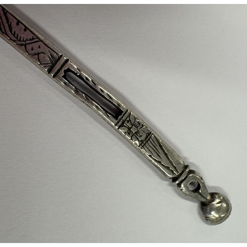 149 - A 17th Century silver bodkin with engraved decoration. Approx. 12 grams. Est. £200 - £300.