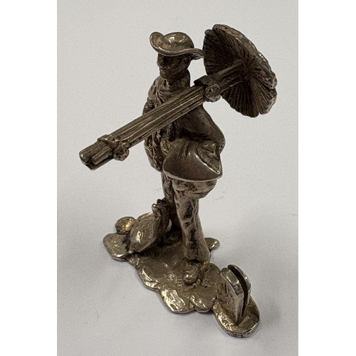 158 - A large silver table toy of a chimney sweep. Approx. 58 grams. Est. £50 - £80.