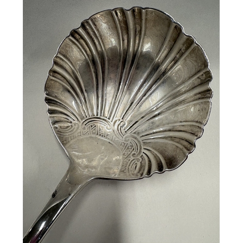 16 - A large 18th Century George III silver bottom marked soup ladle. London 1756. By William Turner. App... 