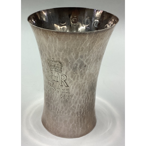 163 - A hammered silver goblet commemorating the Queen's Silver Jubilee. London 1977. Approx. 100 grams. E... 